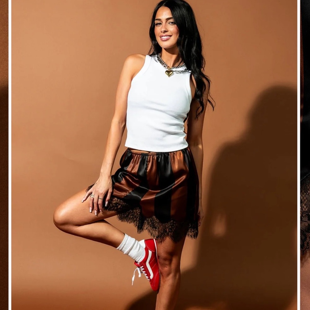 Dressed in LALA Brown and Black shorts with Lace